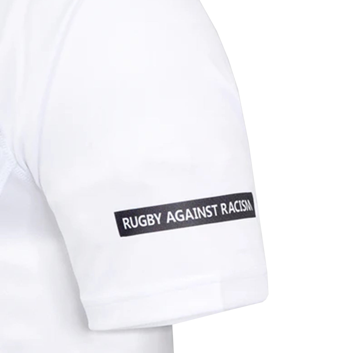 A close-up of the Bath Rugby 25/26 Away Jersey by Castore sleeve, featuring a "RUGBY AGAINST RACISM" black patch and highlighting the team's partnership with Castore.