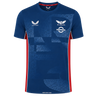 The Scarlets Training Tee 22/23 by Castore features blue short sleeves, an athletic fit, geometric patterns, white sponsor and team logos on the chest, and bold red side panels.