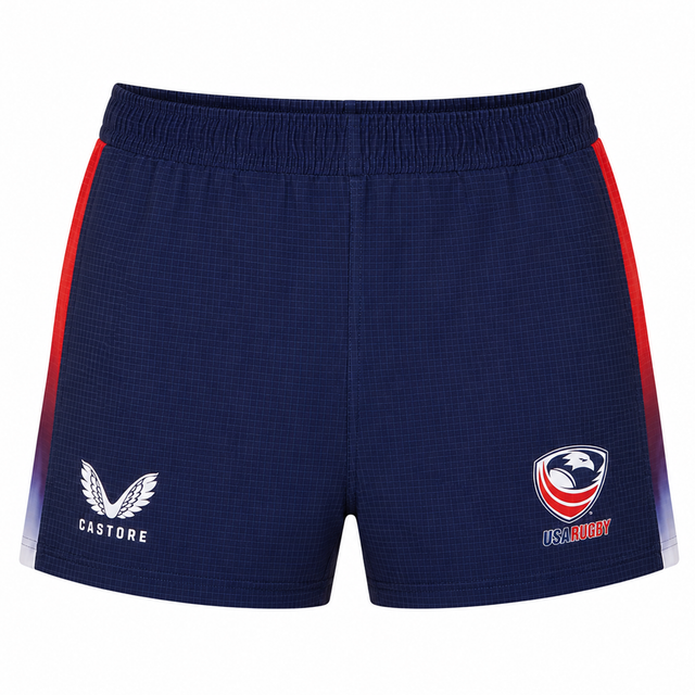 The USA Rugby Pro Home Short 22/23 by Castore features navy blue fabric with red and white side panels, plus the Castore logo on the left and the USA Rugby logo on the right—ideal for rugby fans.