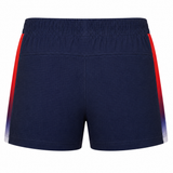 The USA Rugby Pro Home Short 22/23 by Castore features navy blue textured fabric, an elastic waistband, and red-to-white gradient side panels, shown from the back.