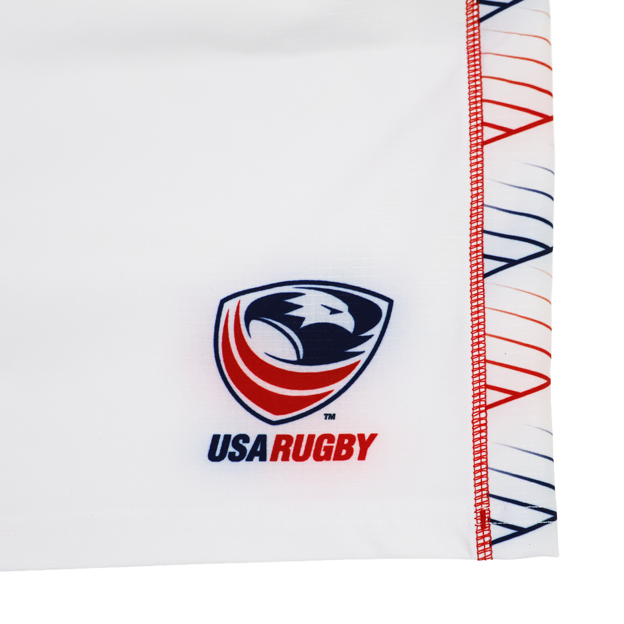 Close-up of Castore’s USA Rugby 22/23 7's RWC Home Pro Short, showcasing the iconic eagle logo and red, white, and blue diagonal seam—perfect for rugby fans.