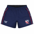 The USA Rugby 22/23 7's RWC Away Pro Short by Castore is a navy blue short with red accents, featuring the USA Rugby logo on the right leg and the Castore logo on the left.