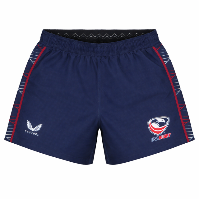 The USA Rugby 22/23 7's RWC Away Pro Short by Castore is a navy blue short with red accents, featuring the USA Rugby logo on the right leg and the Castore logo on the left.