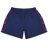 USA Rugby 22/23 7's RWC Away Pro Shorts by Castore in navy blue, featuring red and white geometric side panels—official USA Rugby design, shown from the back.