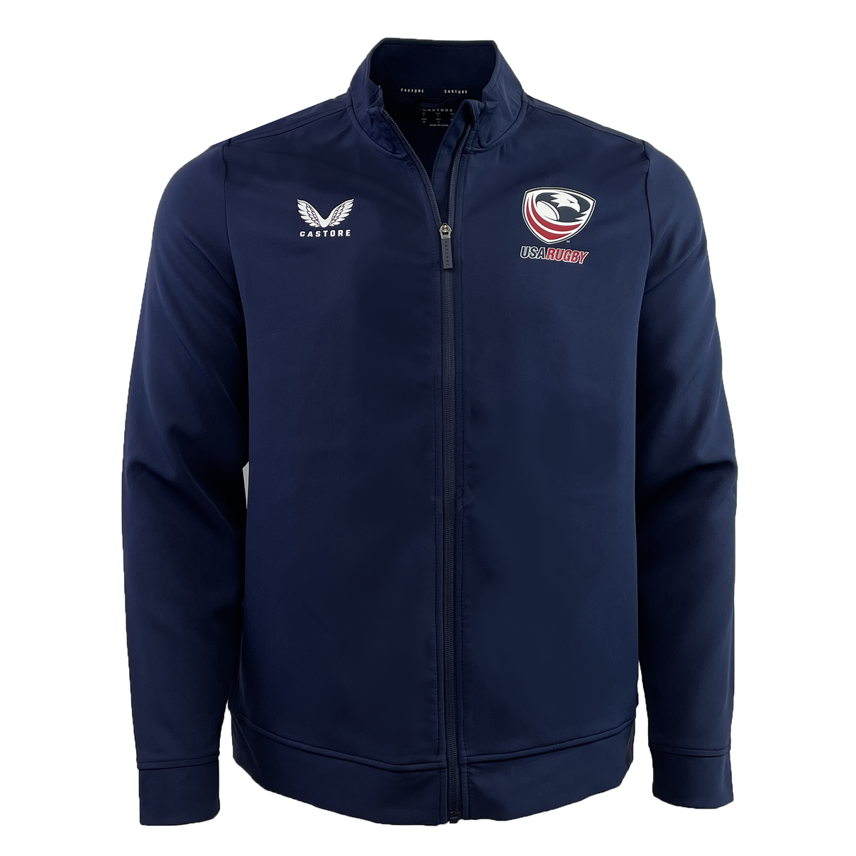 Navy Women's USA Rugby Track Jacket by Castore with full zipper, adorned with the US Rugby logo and a winged Eagles emblem on the chest.