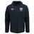 The USA Rugby Rain Jacket by Castore is black with a hood, features a zipper, the "Castore" logo on the left chest, and the "USA Eagles" logo on the right. It's designed with water-resistant technology and a lightweight mesh lining for comfort and protection.
