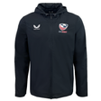 The USA Rugby Rain Jacket by Castore is black with a hood, features a zipper, the "Castore" logo on the left chest, and the "USA Eagles" logo on the right. It's designed with water-resistant technology and a lightweight mesh lining for comfort and protection.