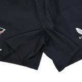 Close-up of the crotch area of Castore Harlequins 23/24 Home Shorts, showing stitching details and partial leg logos.