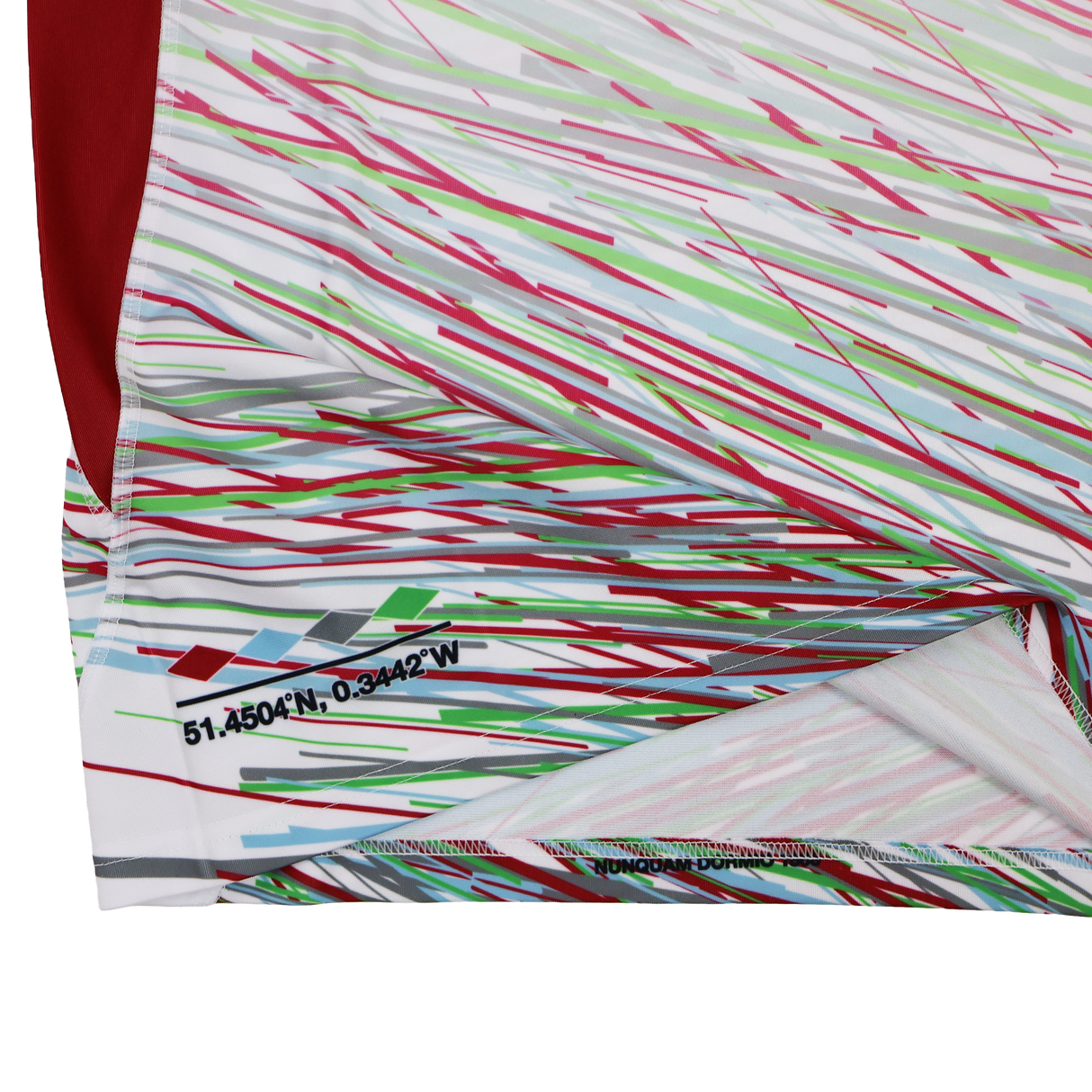Close-up of the Harlequins Replica Away Jersey 23/24 by Castore, featuring diagonal multicolored lines and a small printed coordinate "51.4504°N, 0.3442°W" near the hem.