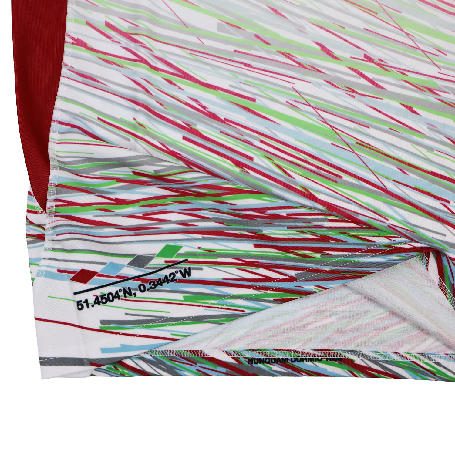 Close-up of the Harlequins Replica Away Jersey 23/24 by Castore, featuring diagonal multicolored lines and a small printed coordinate "51.4504°N, 0.3442°W" near the hem.