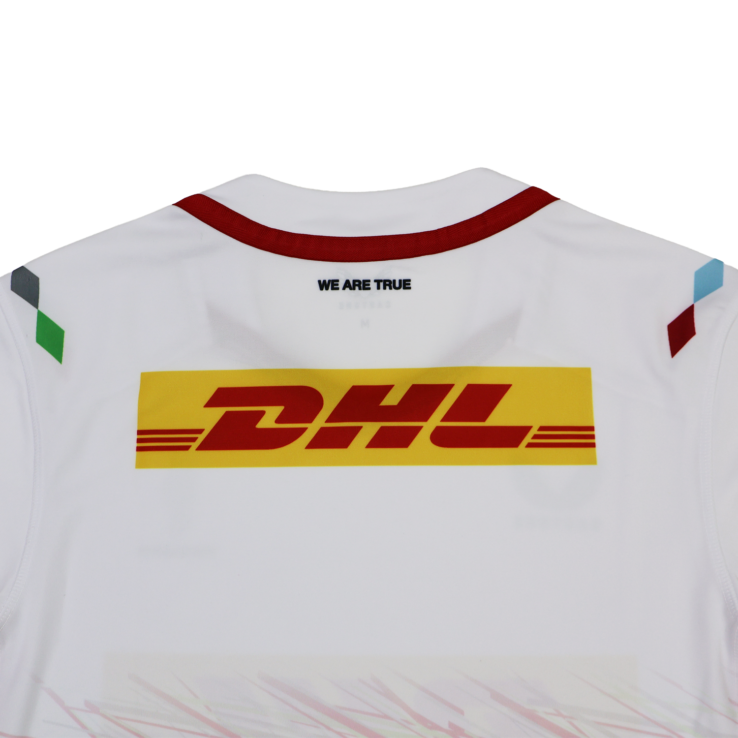 Back view of the Harlequins Replica Away Jersey 23/24 by Castore in white, featuring a yellow DHL logo and "WE ARE TRUE" below the collar, plus colored shoulder accents—a stylish fan jersey from Castore.