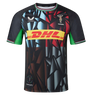 The Harlequins 23/24 Replica Third Jersey by Castore features a geometric black, blue, and red design with green accents, DHL front sponsor logo, and moisture-wicking fabric for comfort on and off the pitch.