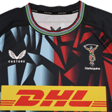 Front view of the Harlequins 23/24 Replica Third Jersey by Castore, a moisture-wicking jersey with geometric patterns, official logos, and a prominent DHL sponsor logo on the chest.