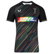 The Castore Harlequins 23/24 Pro Pride Jersey features black fabric with multicolored diagonal stripes, a rainbow DHL logo, and sponsor logos—celebrate inclusivity in this bold pride flag sportswear.