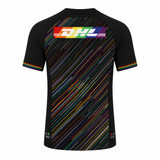 Back view of the Harlequins 23/24 Pro Pride Jersey by Castore—a black short-sleeve rugby jersey with multicolored diagonal stripes, a rainbow DHL logo on the upper back, and Pride flag-inspired rainbow trim on sleeves and collar.