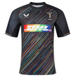 The Harlequins Replica Pride Jersey 23/24 by Castore is a black rugby jersey with diagonal rainbow stripes, featuring DHL and Castore logos plus the Harlequins emblem on the chest.