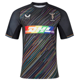 The Harlequins Replica Pride Jersey 23/24 by Castore is a black rugby jersey with diagonal rainbow stripes, featuring DHL and Castore logos plus the Harlequins emblem on the chest.