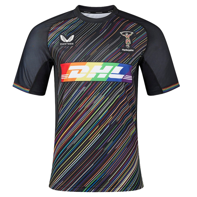 The Harlequins Replica Pride Jersey 23/24 by Castore is a black rugby jersey with diagonal rainbow stripes, featuring DHL and Castore logos plus the Harlequins emblem on the chest.