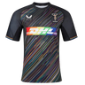 The Harlequins Replica Pride Jersey 23/24 by Castore is a black rugby jersey with diagonal rainbow stripes, featuring DHL and Castore logos plus the Harlequins emblem on the chest.