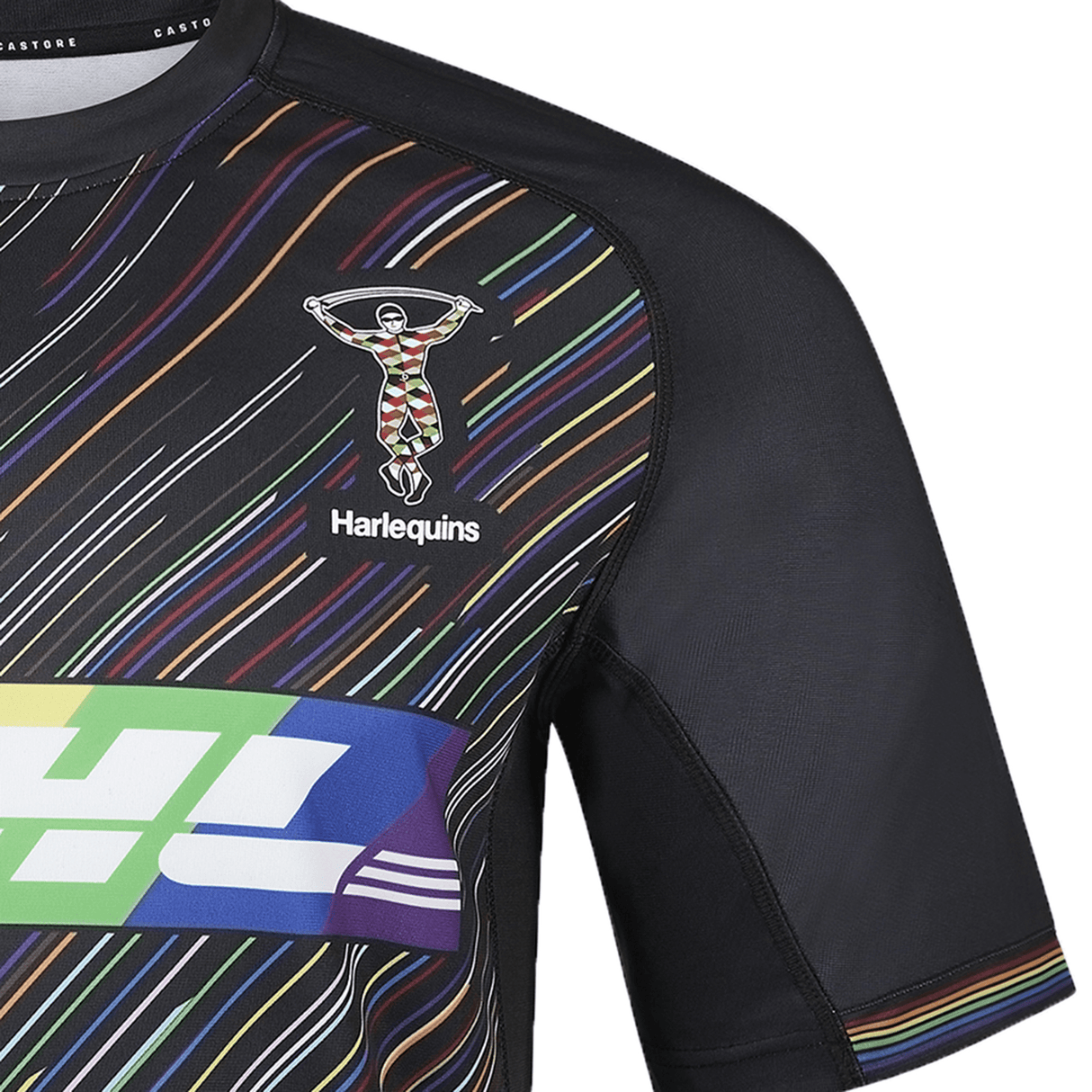 The Harlequins Replica Pride Jersey 23/24 by Castore is a black jersey with colorful diagonal stripes and the club’s iconic chest logo.