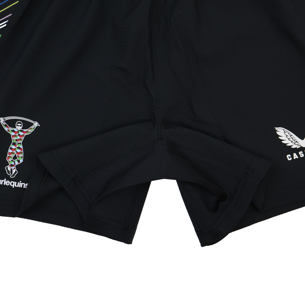 Close-up of Harlequins 23/24 Pro Pride Short by Castore, black athletic-fit rugby shorts with the Harlequins club logo on the left and Castore branding on the right.