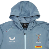 The Harlequins 23/24 Matchday Zip Through Hoodie by Castore features a light blue design, hood, DHL sponsor patch, and the iconic crest—official teamwear for Harlequins fans.