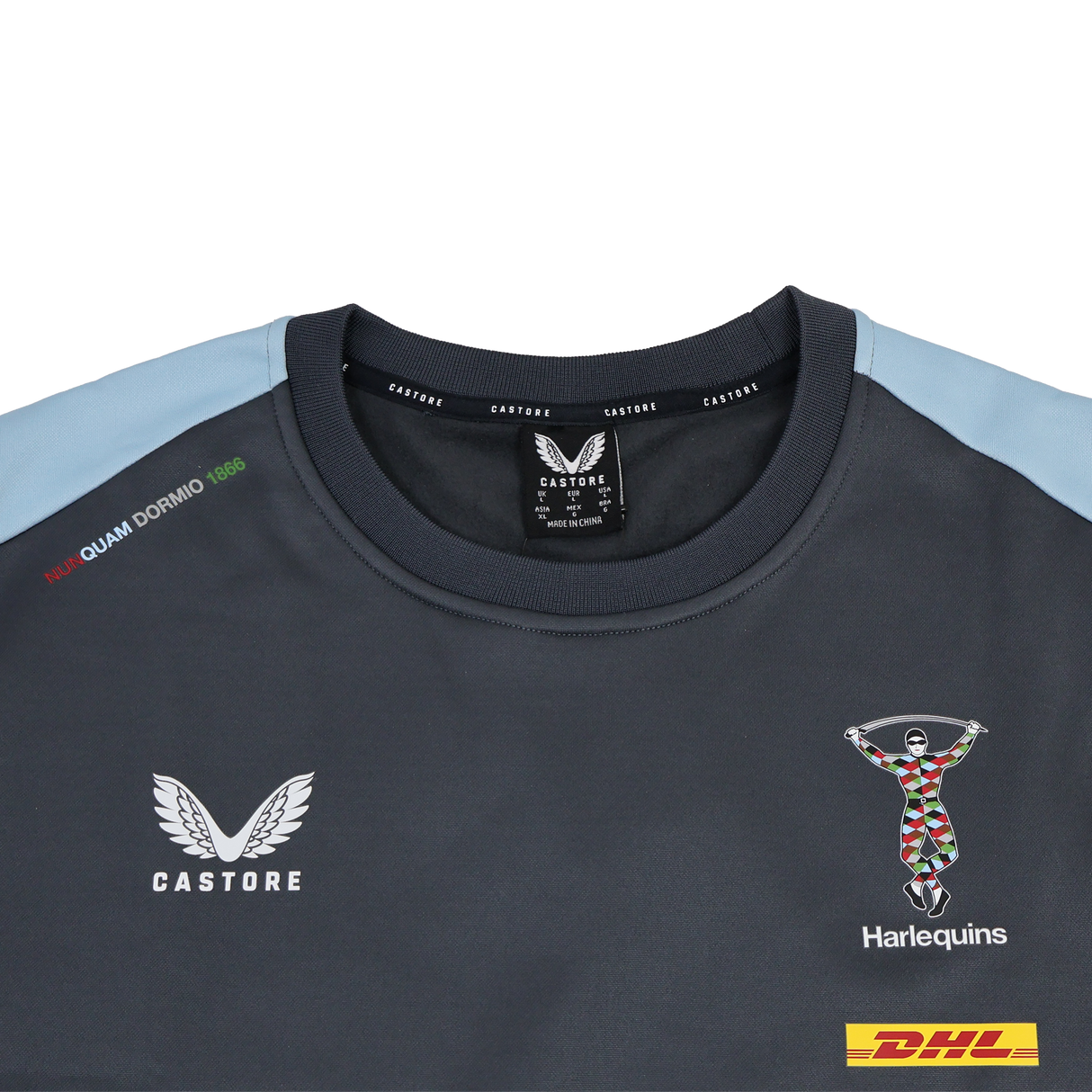 The Harlequins 23/24 Training Sweatshirt by Castore features dark colors, blue shoulder panels, DHL logos, and "DULCE QUAM DORMIO 1866" on the upper left chest—a standout pick for dedicated fans.