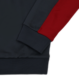 Close-up of the Harlequins 23/24 Training Sweatshirt by Castore, featuring a dark body, red sleeve, and dark ribbed cuff, shown against a plain white background.