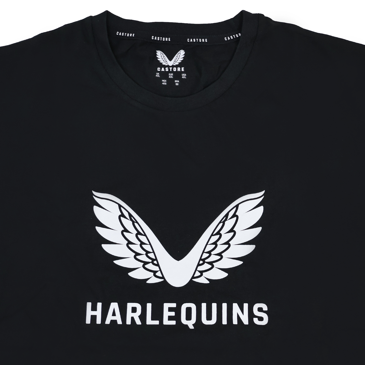 The Harlequins 23/24 Cotton Logo Tee by Castore is a black cotton tee with a white winged Harlequins logo above "HARLEQUINS" and Castore branding on the collar.