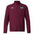 The Scarlets 23/24 Travel Jacket Men's by Castore in maroon features teal Castore and Scarlets chest logos, displayed against a plain white background.