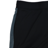 Close-up of Saracens Pro Home Shorts 23/24 by Castore, showcasing black fabric with a blue side panel and an elastic waistband—crafted for elite comfort and style both on and off the field.