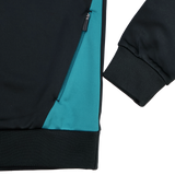 Close-up of the Castore Bath 23/24 Full Zip Hoodie in black with a teal side panel, featuring a zippered pocket, ribbed waistband, and long sleeves with ribbed cuffs—ideal for rugby fans.