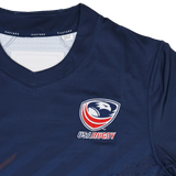 The USA Rugby 24/25 Pro Home Jersey by Castore features a navy blue design with the USA Rugby logo, eagle emblem on the chest, and signature Castore branding on the collar.