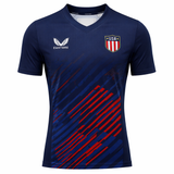 The USA Rugby 24/25 7s Olympic Pro Home Jersey by Castore features navy blue with red diagonal stripes, a "USA" chest badge, and a white Castore logo—styled like official USA Rugby 7s or Olympic Pro jerseys.