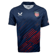 The USA Rugby 24/25 Olympic 7's Jersey by Castore features navy blue fabric, red diagonal stripes, a USA badge on the left chest, Castore logo on the right chest, and an American flag on the sleeve—ideal for Eagles fans.