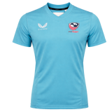The USA Rugby 24/25 Pro Training Jersey by Castore is a light blue short-sleeve top with the USA Rugby and Castore logos on the chest.
