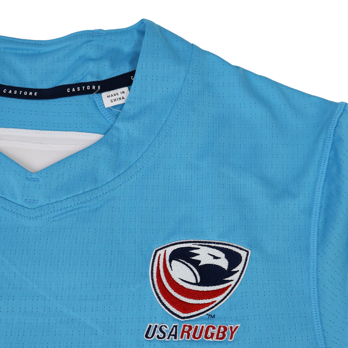 Light blue USA Rugby 24/25 Pro Training Jersey by Castore with eagle logo and "USARUGBY" on the chest; Castore branding and internal GP
S pocket.