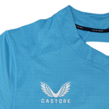 The USA Rugby 24/25 Pro Training Jersey by Castore is a light blue top featuring the Castore logo with white wings and embroidered branding on the chest—ideal for fans of USA Rugby.
