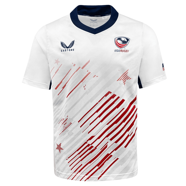 The USA Rugby 24/25 Replica Away Jersey by Castore features a white design with navy collar, red diagonal stripes, star accents, moisture-wicking fabric, and Castore USA Rugby logos on the chest.