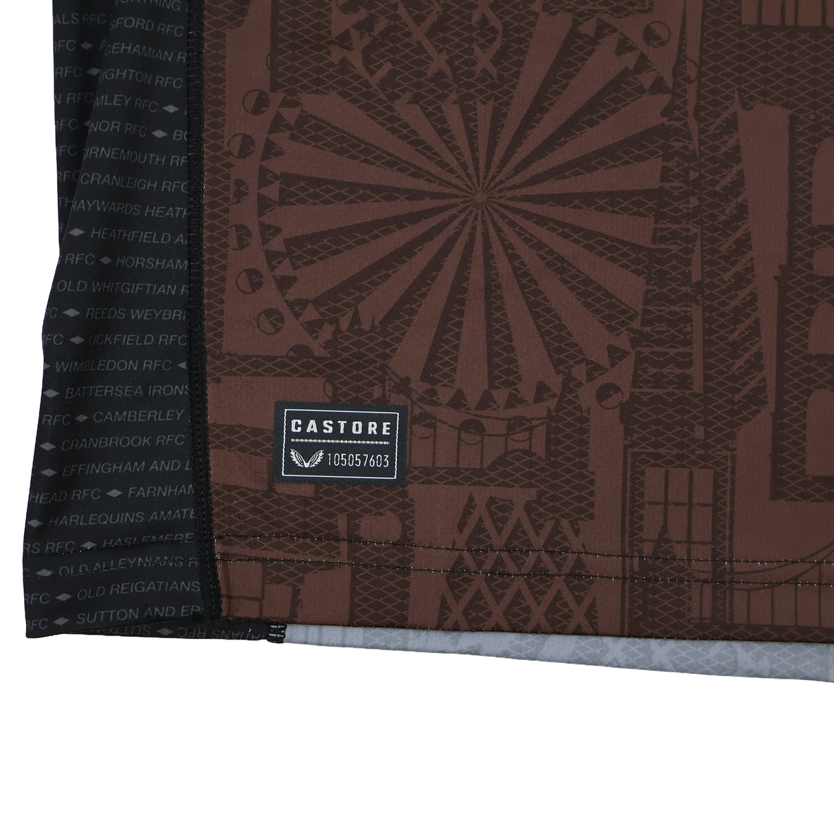 Close-up of the Harlequins 24/25 Replica Home Jersey by Castore, showcasing geometric and architectural patterns, a stitched Castore label, and club names listed on the black section.
