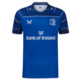 Show your Leinster pride in the Leinster 24/25 Home Replica Jersey by Castore, featuring white sponsor logos, a geometric shoulder pattern, and short sleeves—a must-have for any fan.
