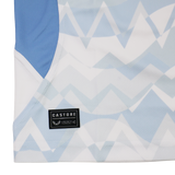 Close-up of the Leinster 24/25 Replica Away Jersey by Castore, featuring a blue and white zigzag pattern, solid blue side panel, and a black Castore label near the hem.