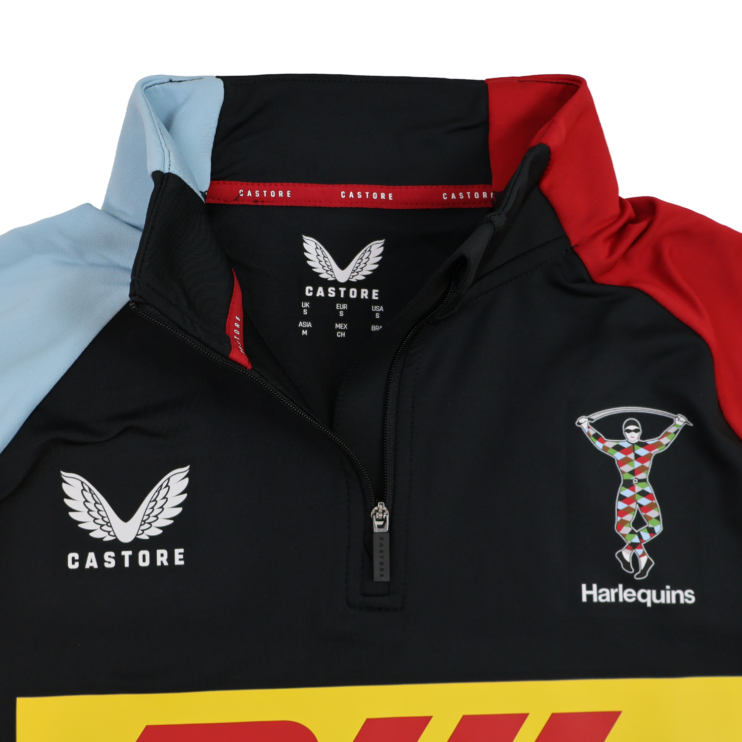 Close-up of the Harlequins 24/25 Matchday 1/4 Zip Midlayer by Castore, showcasing sponsor logos, a quarter-zip collar, and a bold multicolored panel design.