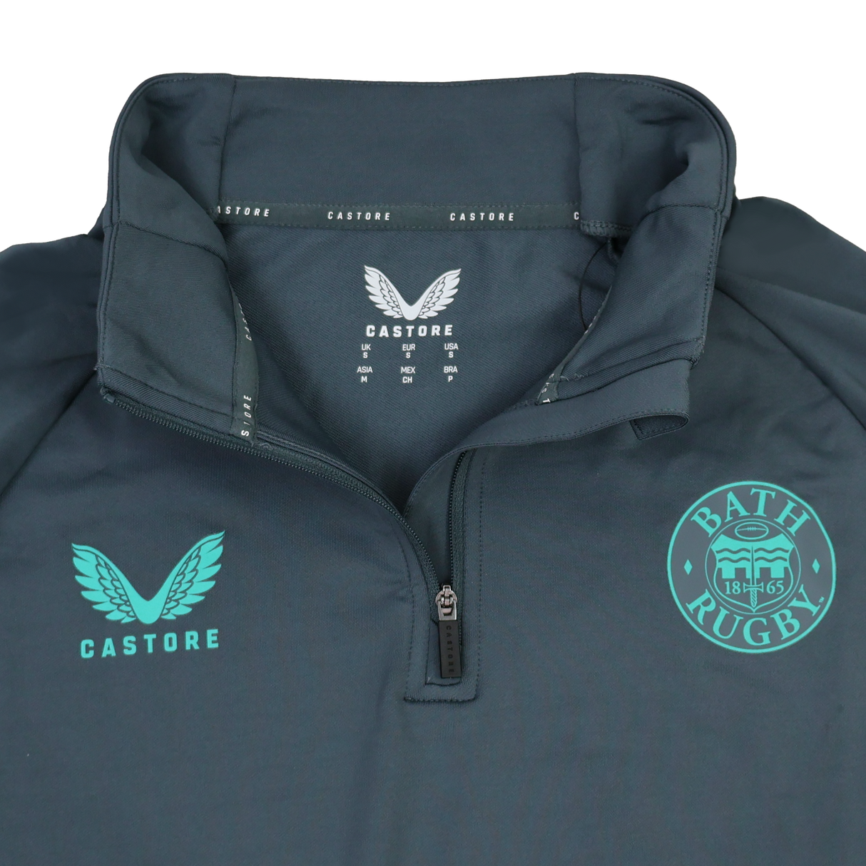 The Bath 24/25 Pro Players 1/4 Zip Midlayer by Castore features moisture-wicking fabric and displays the "BATH RUGBY" emblem alongside the Castore logo in teal on the chest.