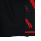 Close-up of Saracens 23/24 Pro Home Shorts by Castore, showcasing black fabric with red and gray abstract streaks along the edge and detailed hem stitching.