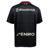 Back of the Saracens 24/25 Replica Home Jersey by Castore in black, with white "shawbrook" and "ENMO" logos, plus "EST. 1876" at the collar—a genuine Castore piece.