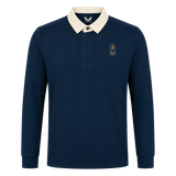 The Leinster 25/26 Dual Branded Jersey by Castore features long sleeves, a navy blue design with a white collar, and two embroidered left chest patches inspired by the classic Leinster Rugby jersey.