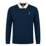 The Leinster 25/26 Dual Branded Jersey by Castore features long sleeves, a navy blue design with a white collar, and two embroidered left chest patches inspired by the classic Leinster Rugby jersey.