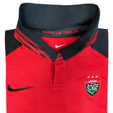 A red and black RC Toulon Home Rugby Jersey 23/24 by Nike with the Nike logo on it.