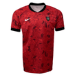 A red sports jersey with black collar and cuffs, featuring an RC Toulon Replica Home Jersey logo in black and white on the left chest and a white Nike logo on the right chest.